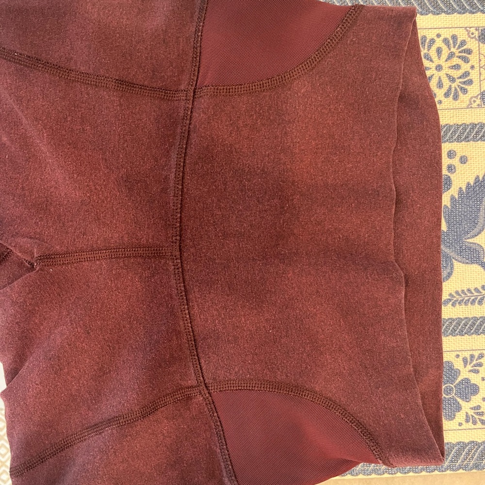 Lululemon Burgundy High-Waisted Leggings- 2 markings from wash -